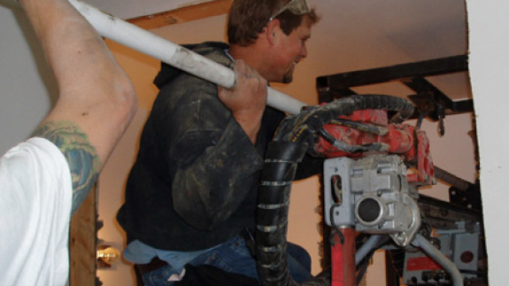 an image of a man using a pipe in the Delaware crossing
